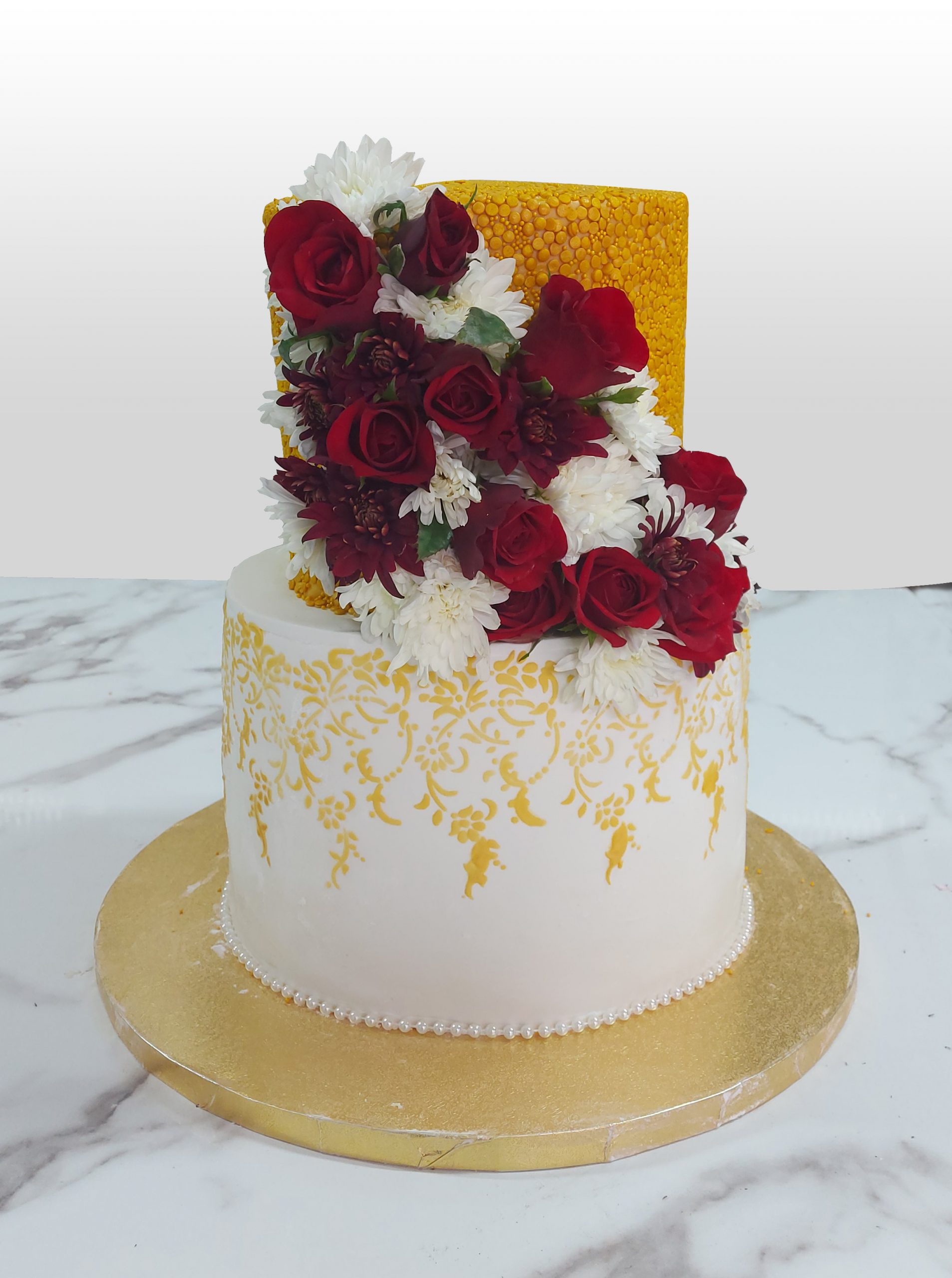 2 tier wedding cake with sugar paste and natural flowers